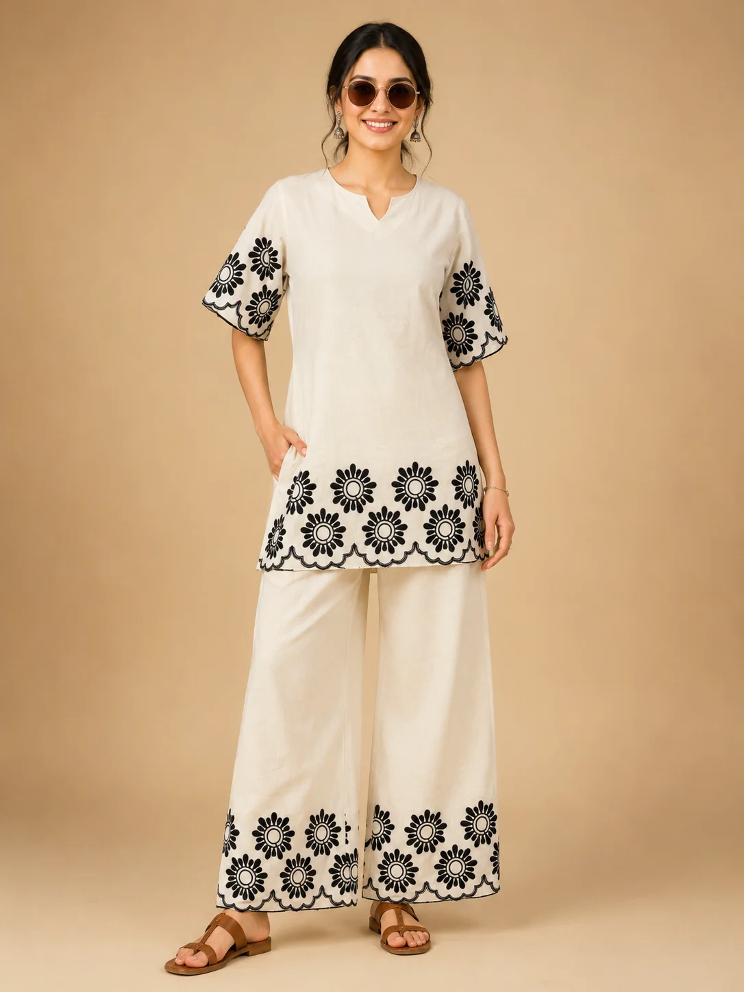 Woman wearing ivory white Khadi Cotton co-ord set with black floral embroidery — View 2