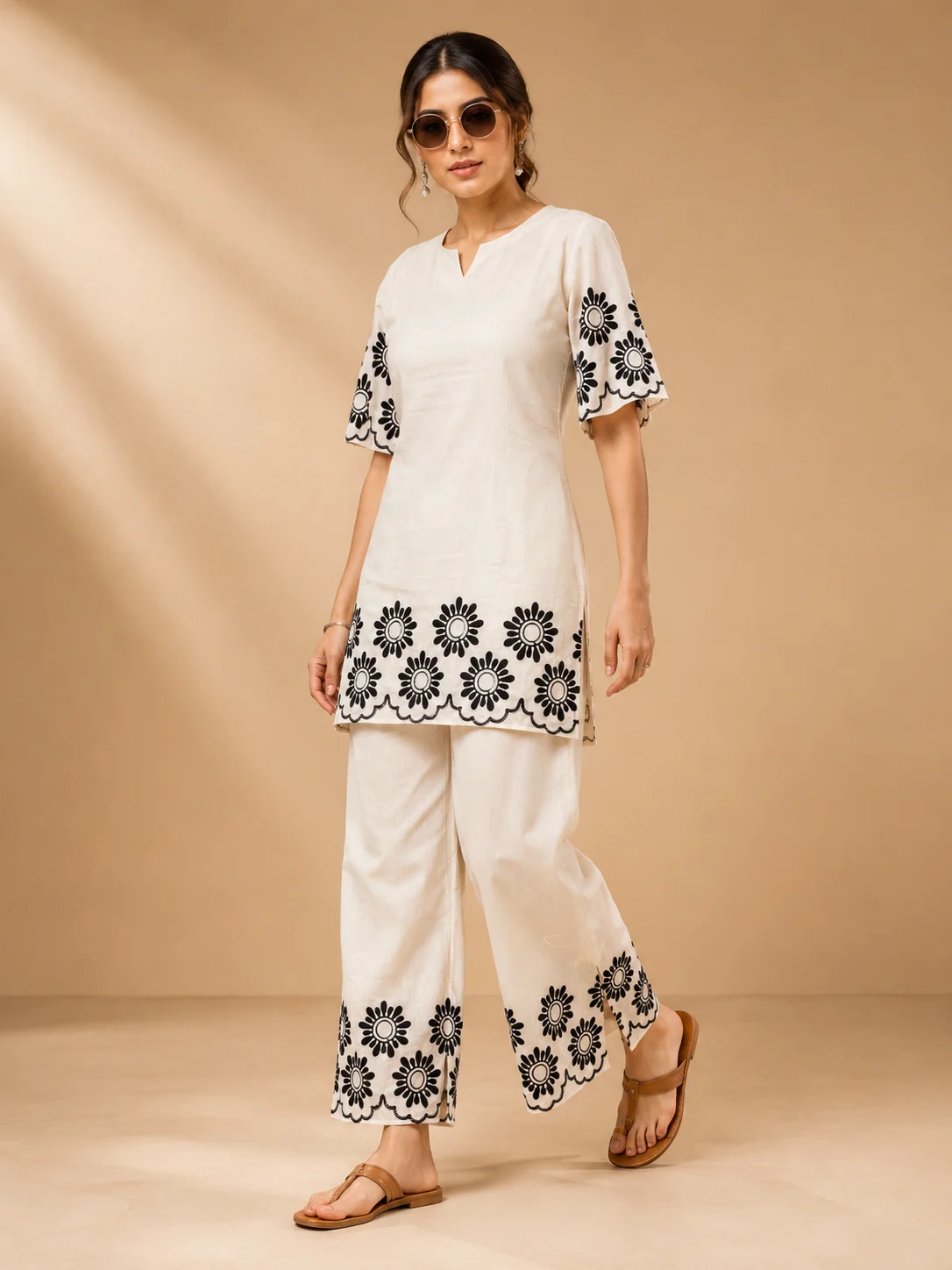 Woman wearing ivory white Khadi Cotton co-ord set with black floral embroidery — View 3