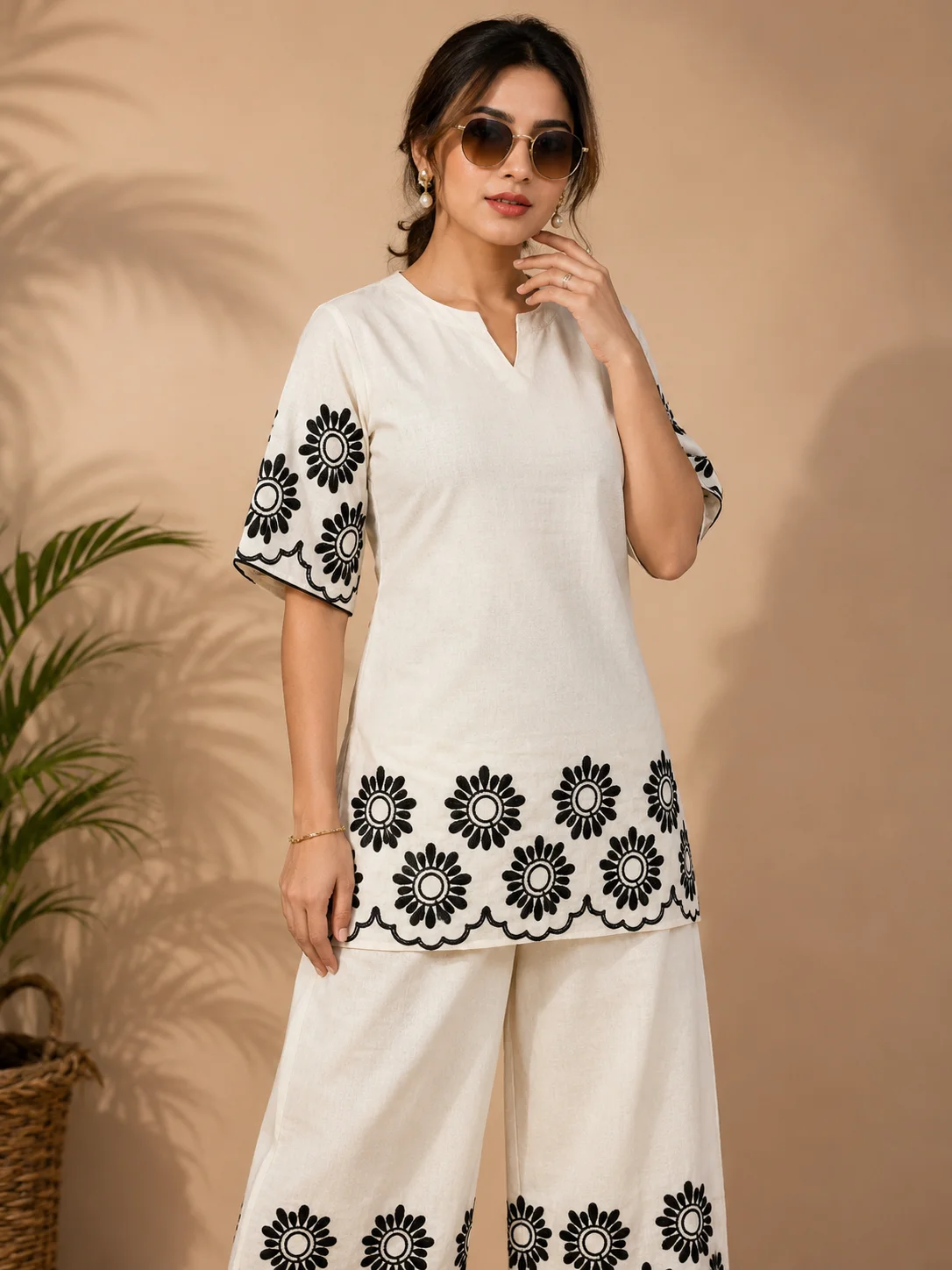 Woman wearing ivory white Khadi Cotton co-ord set with black floral embroidery — View 4