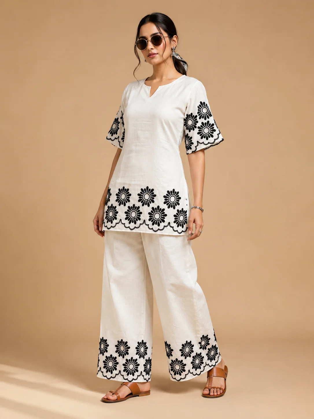 Woman wearing ivory white Khadi Cotton co-ord set with black floral embroidery — View 5